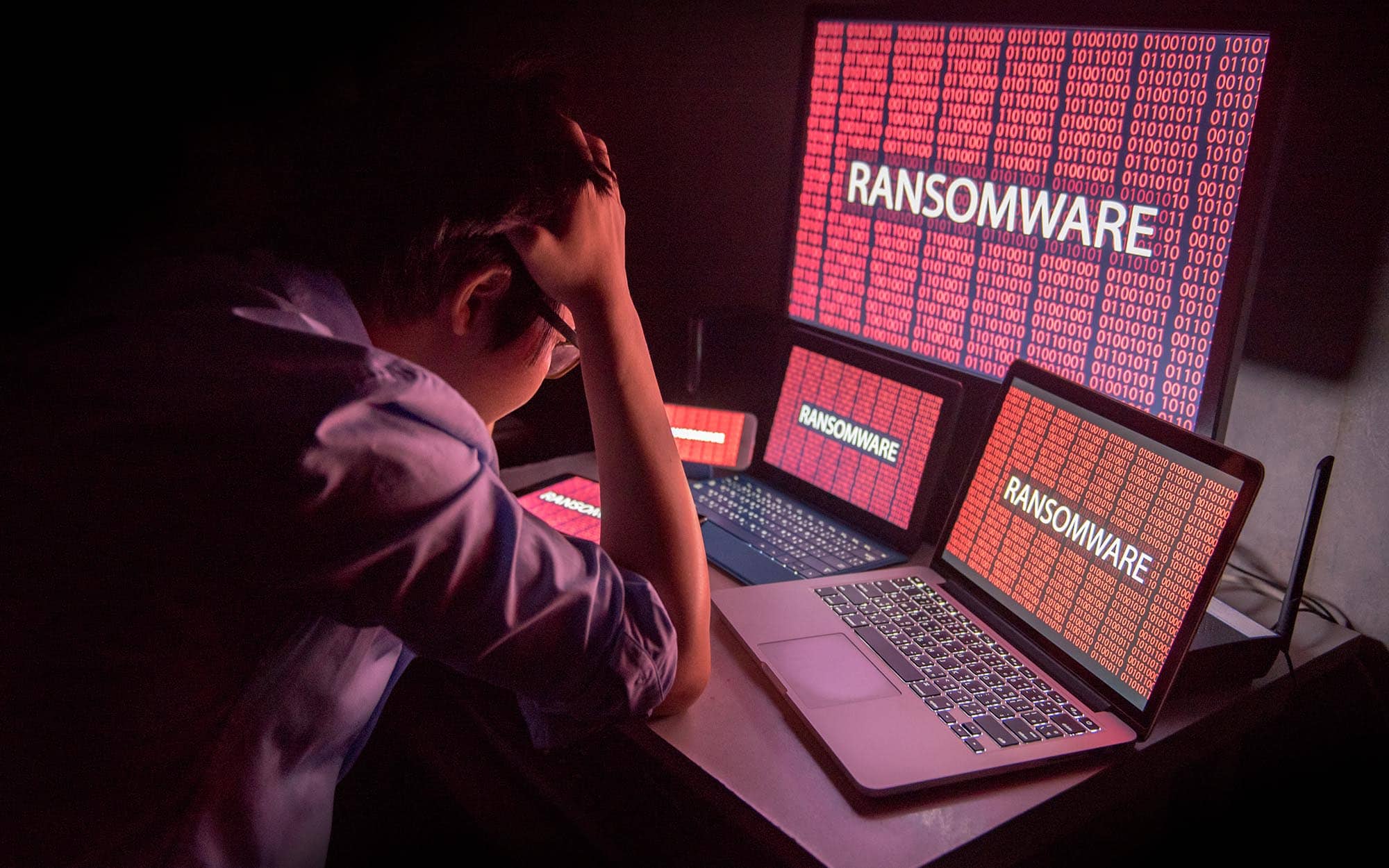 Worker-stressed-out-at-hacked-computer